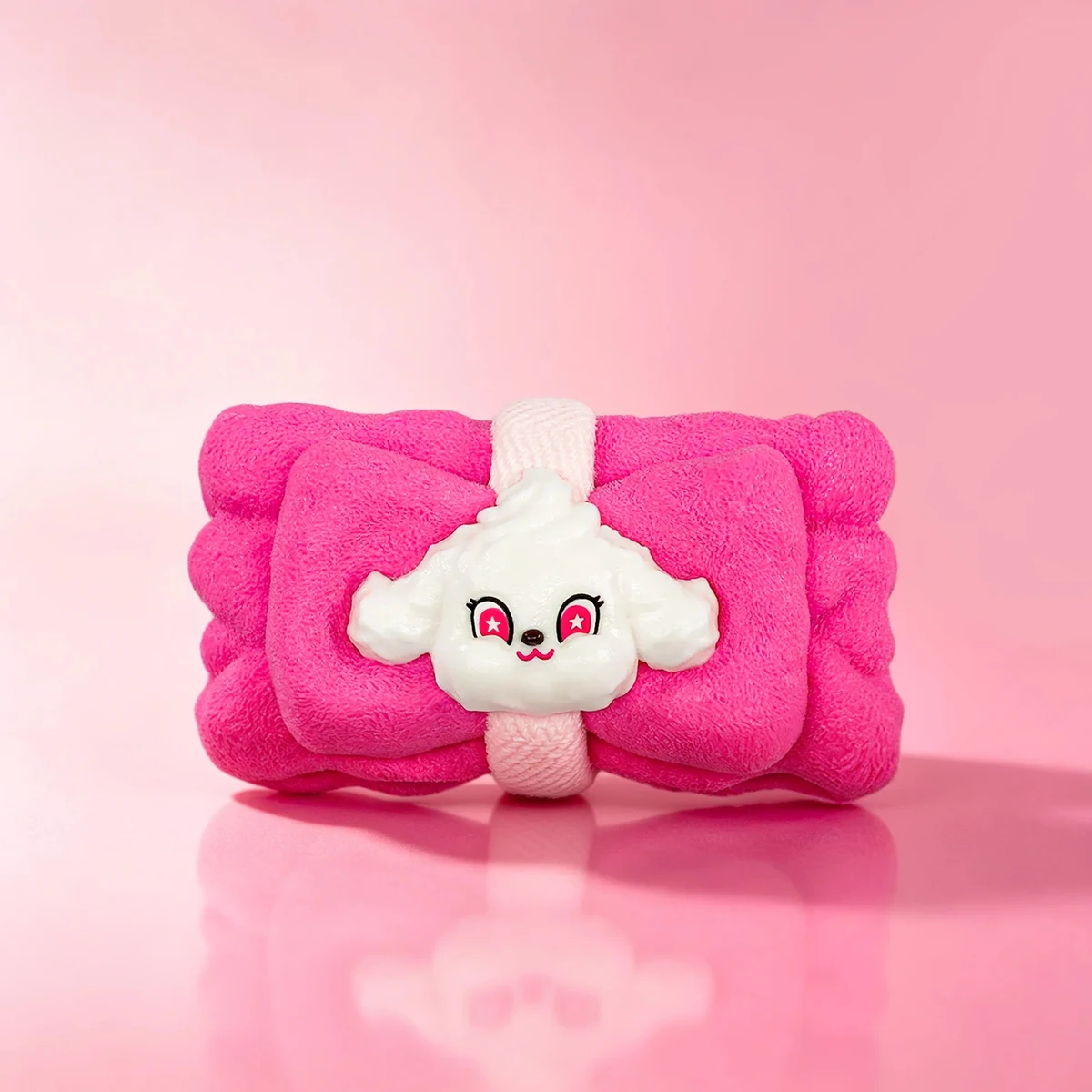 メロジョイ ピンクのリボン型ヘアバンド