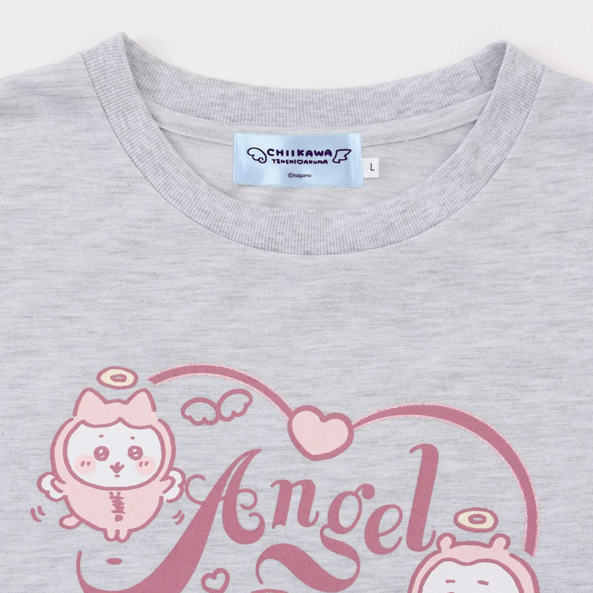 襟のCHIIKAWAのタグ。サイズはL