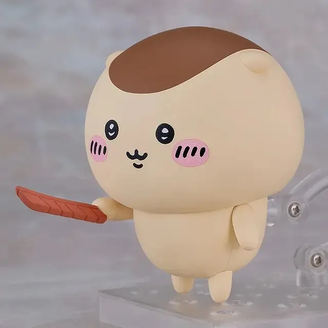 ねんどろいど ちいかわ くりまんじゅうが鮭とばを持ったところ